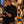 HOUSE OF 3 I · 03 OMBRA – Gentleman stehend in der Galerie, Blick auf den Kunstkatalog